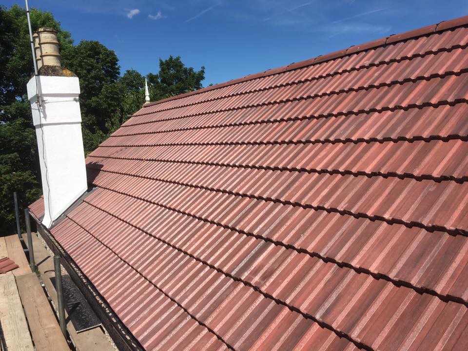 New red concrete tile roof and chimney