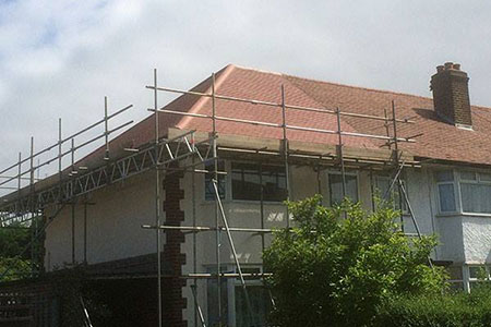 Scaffolding on a house ready for a new roof