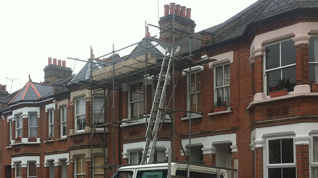 Scaffolding on Victorian terraced houses